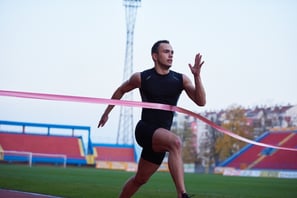 athletic runner finish line track