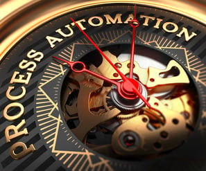 Process Automation on Black-Golden Watch Face with Closeup View of Watch Mechanism.